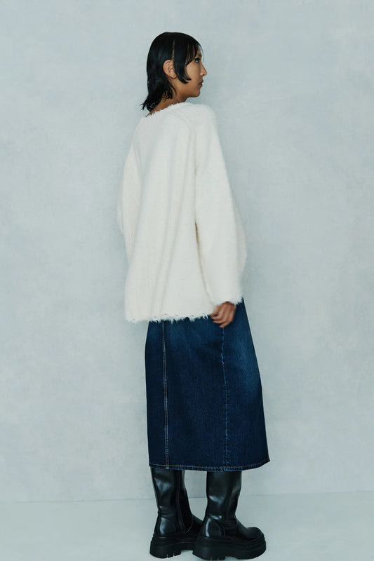 Maglia over sfrangiata Circus Hotel